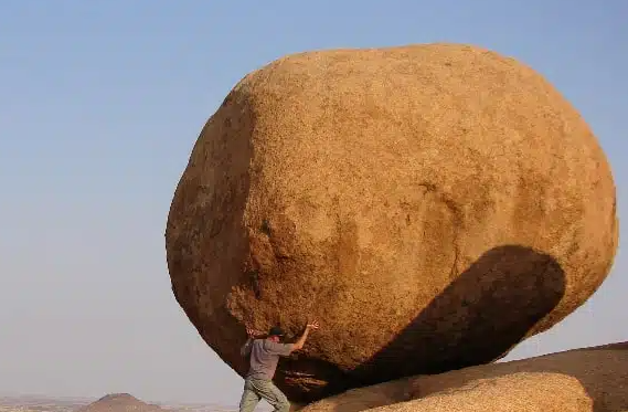 a large gold sandstone rock